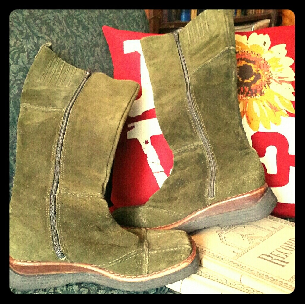 Frye brand knee high leather boots.